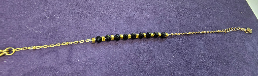 Bracelet Cristaux Noirs Facettés & Cubes Dorés