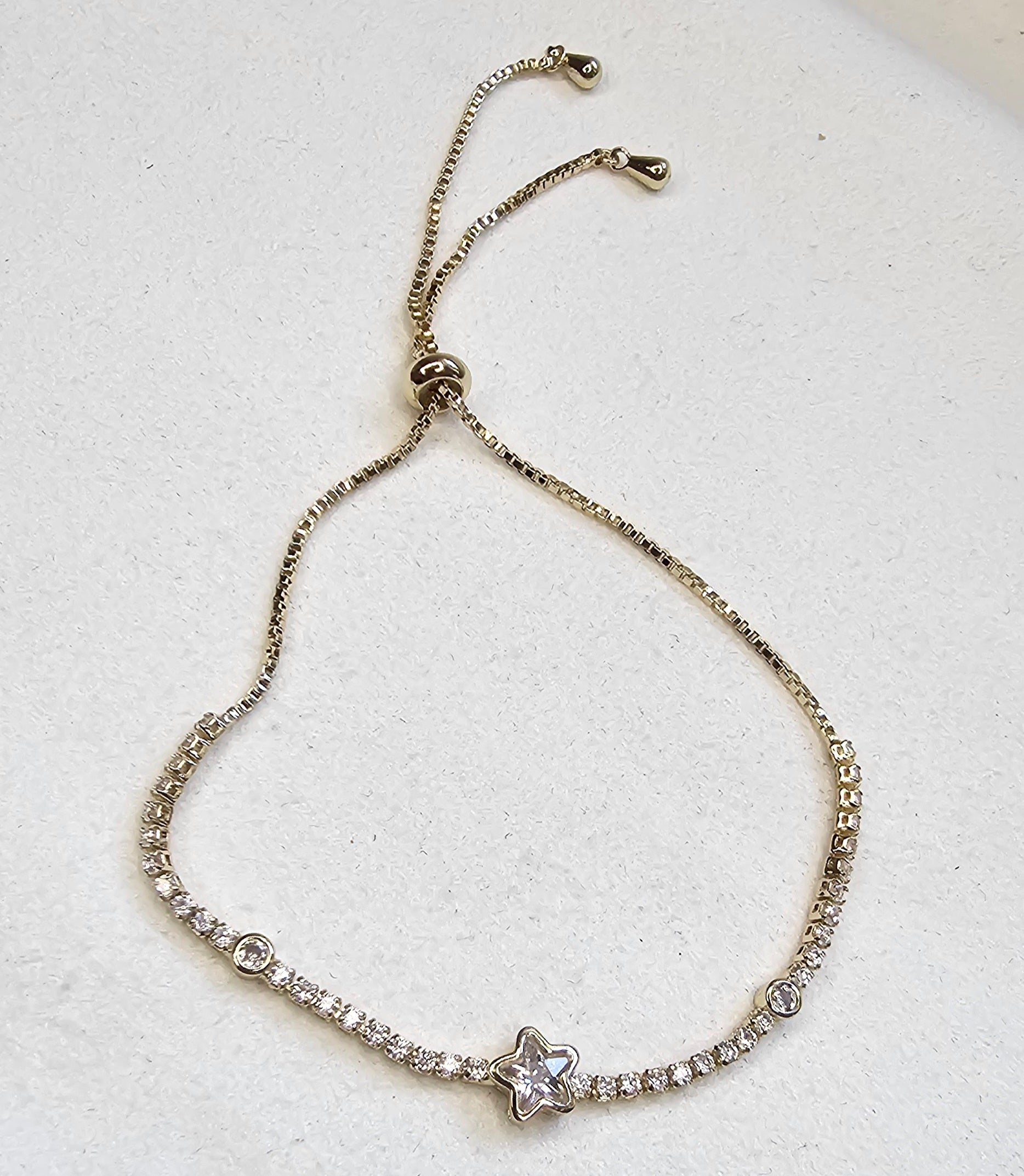 Bracelet tennis argenté ajustable coulissant avec étoile cristal marquise centrale et strass sans nickel