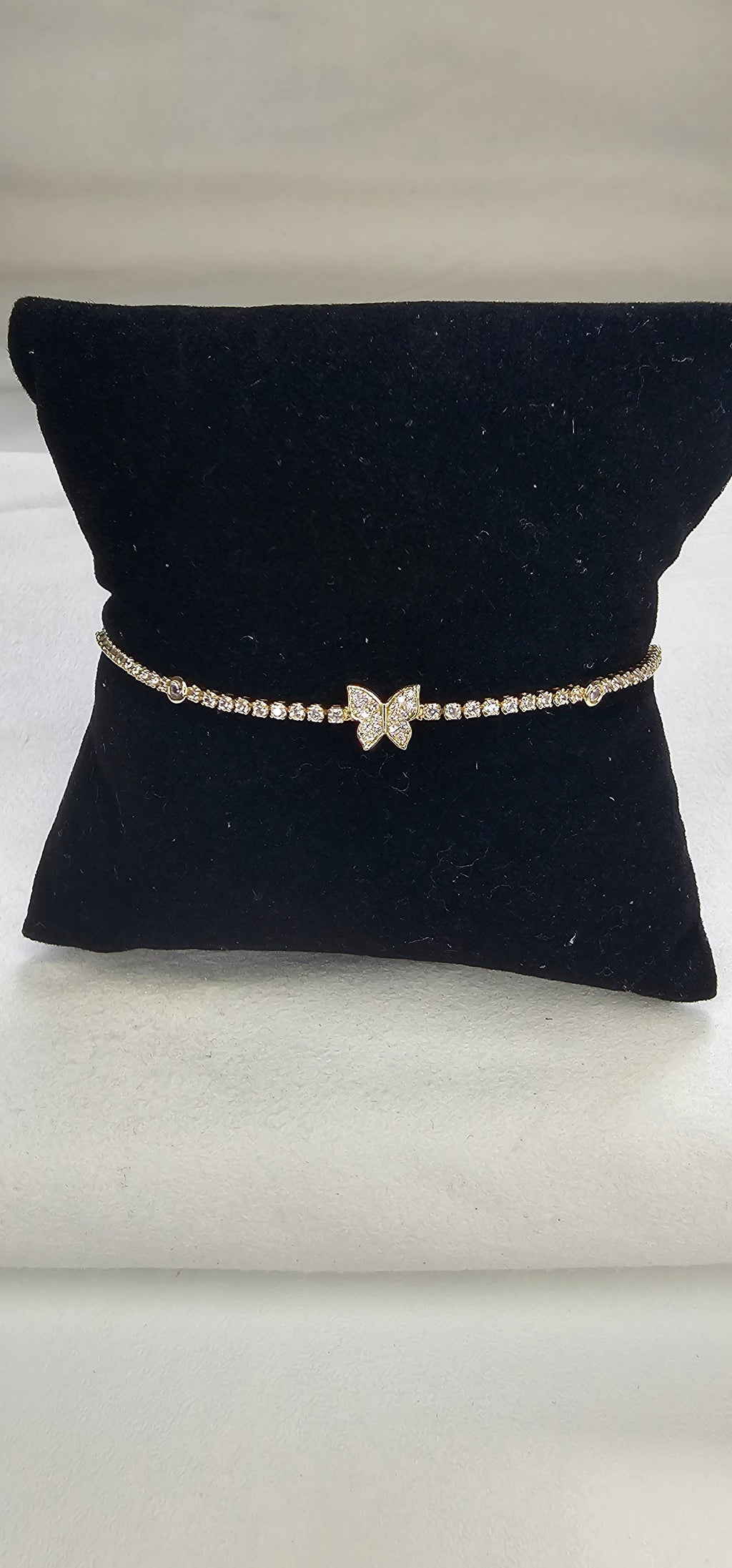 Bracelet tennis doré pavé strass avec papillon central sans nickel