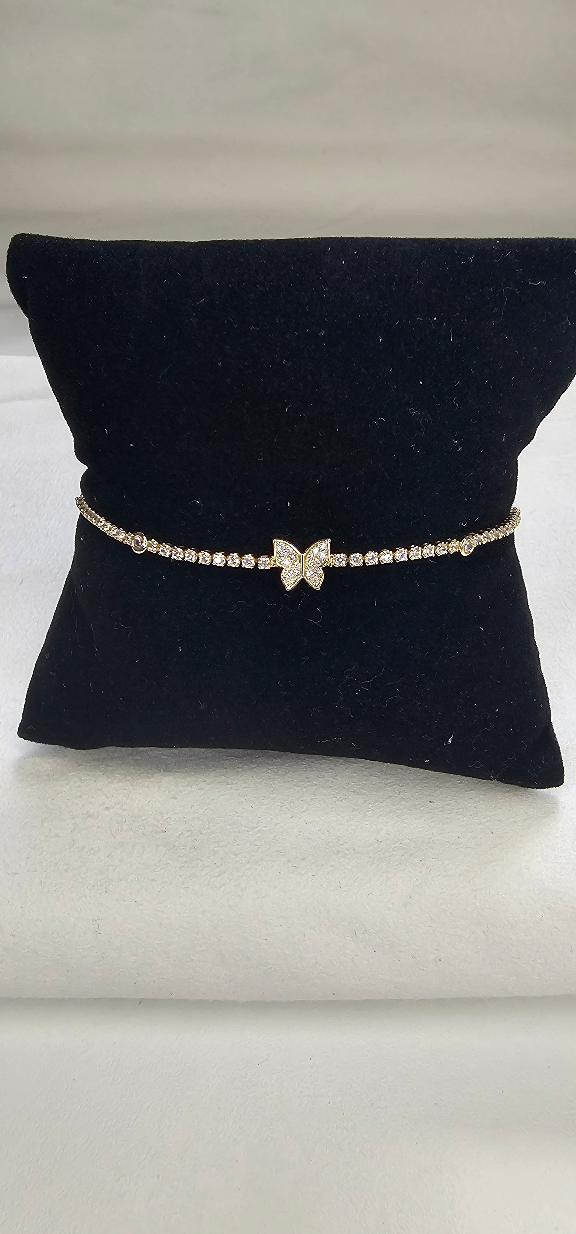 Bracelet tennis doré pavé strass avec papillon central sans nickel