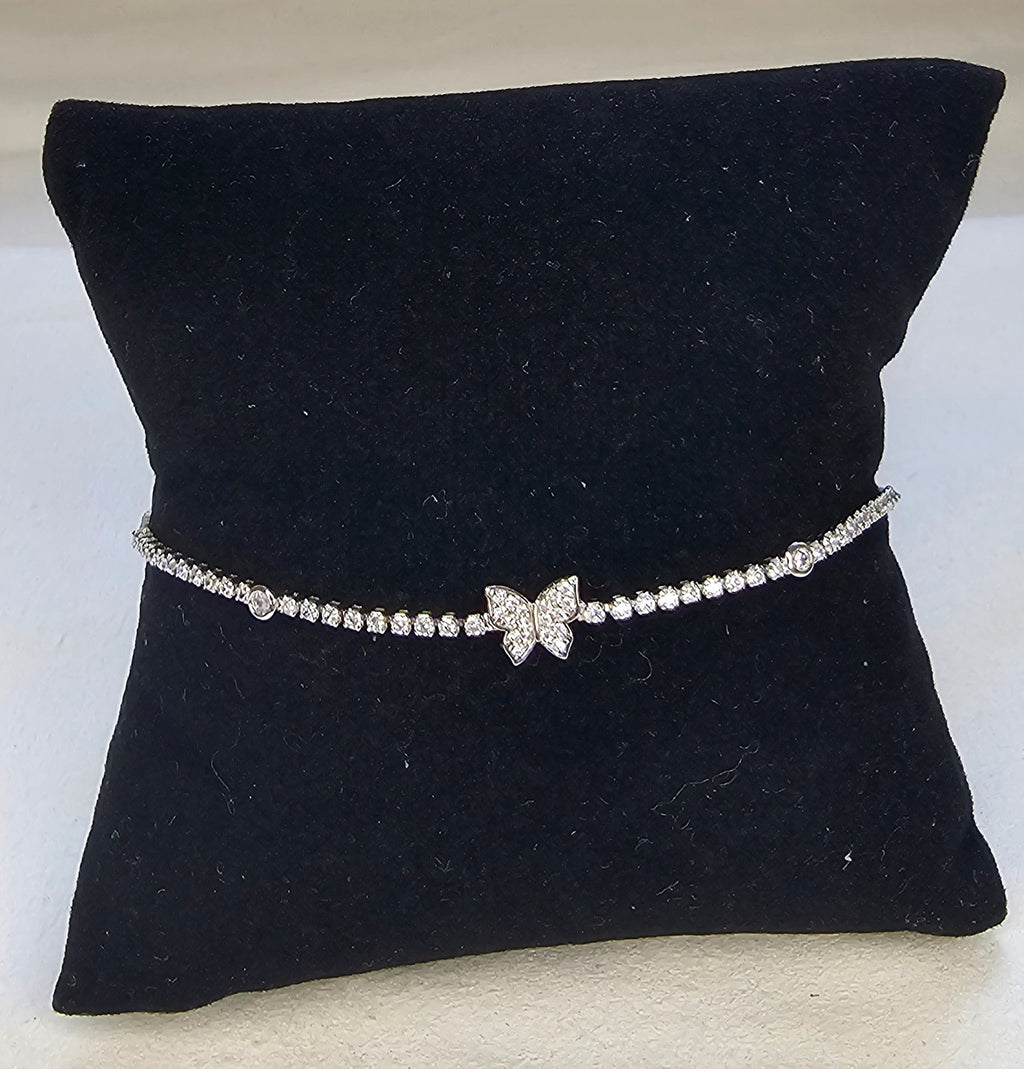 Bracelet tennis argenté pavé strass avec papillon central et oxydes de zirconium sans nickel