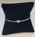 Bracelet tennis argenté pavé strass avec papillon central et oxydes de zirconium sans nickel